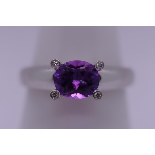 155 - Fine 18ct white gold diamond and amethyst ring - Size N