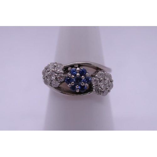 162 - 18ct white gold sapphire and diamond triple cluster ring - Size N