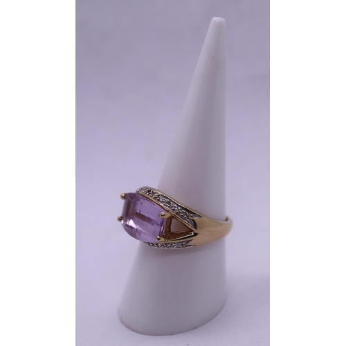 165 - Gold faceted amethyst and diamond ring - Size O