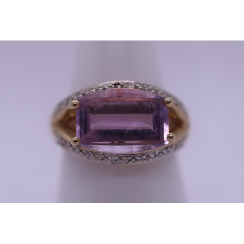 165 - Gold faceted amethyst and diamond ring - Size O