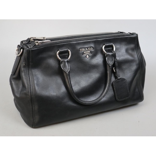 257 - Genuine Prada handbag with original dust bag and C.O.A