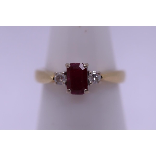 27 - 18ct gold ruby & diamond set ring - Size M