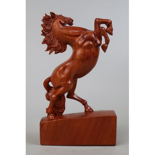 293 - Carved wooden prancing horse