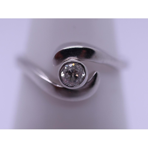 34 - 18ct white gold diamond solitaire ring - Size L