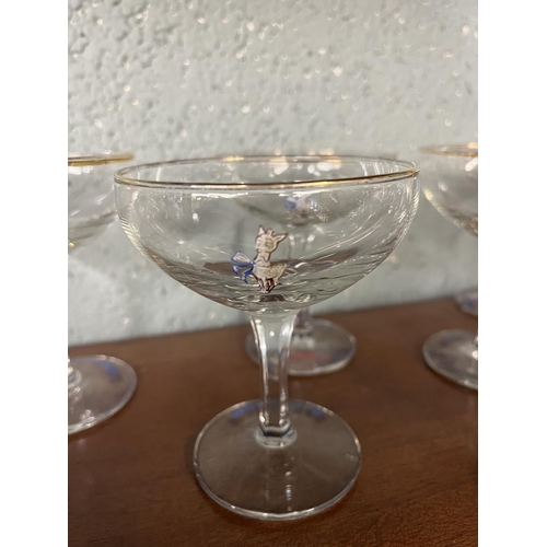 347 - Collection of 13 white fawn Babycham glasses