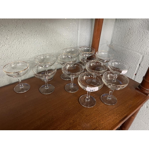 347 - Collection of 13 white fawn Babycham glasses