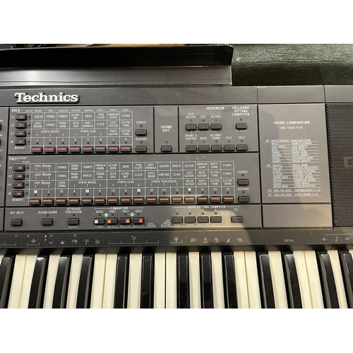 358 - Technics SX-K700 PMC electronic keyboard together with stand, foot pedal, carry case and book in goo... 