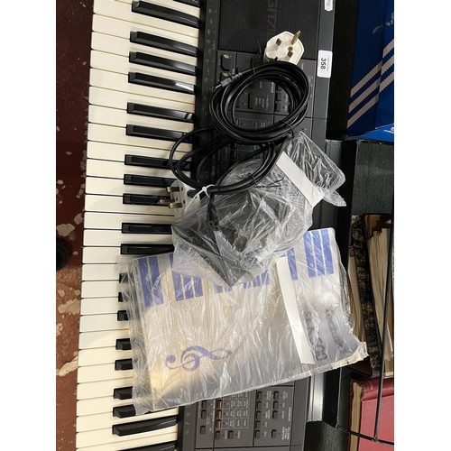 358 - Technics SX-K700 PMC electronic keyboard together with stand, foot pedal, carry case and book in goo... 