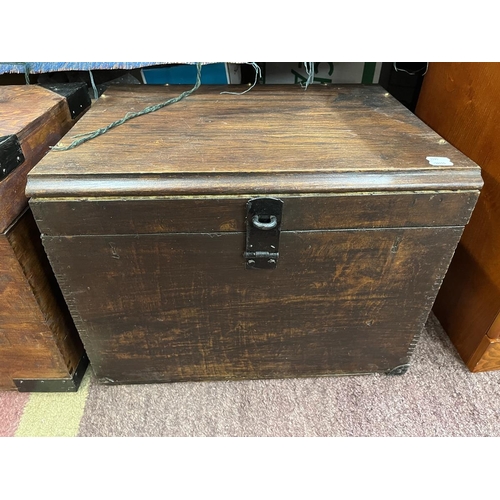 389 - 2 wooden chests, medium size, with metal corner brackets and steel swing handles, possibly ex-milita... 