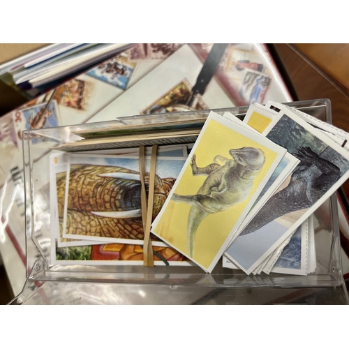 406 - Collection of cigarette cards & stamps