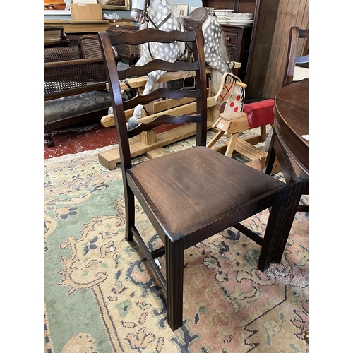 452 - Mahogany pedestal dining table with 5 ladder back dining chairs to include carver. Table approx L: 1... 