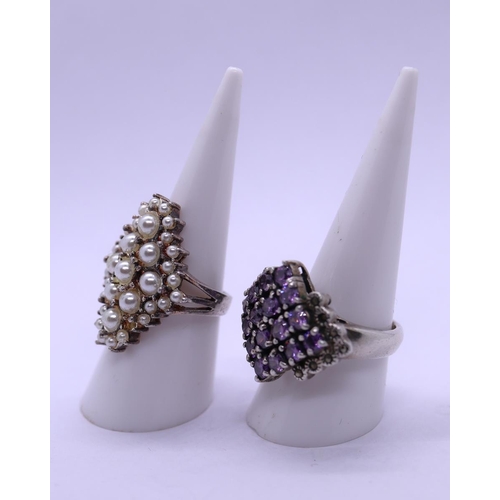 48 - 2 silver dress rings 1 set with amethyst & 1 set with pearls