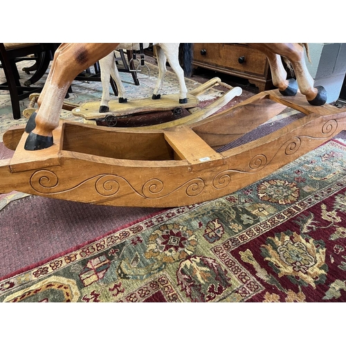 526 - Carved wooden rocking horse