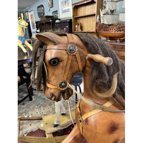 526 - Carved wooden rocking horse