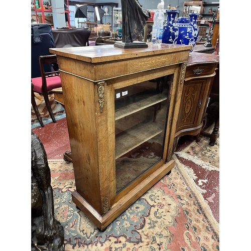 530 - Peer cabinet with ormolu mounts