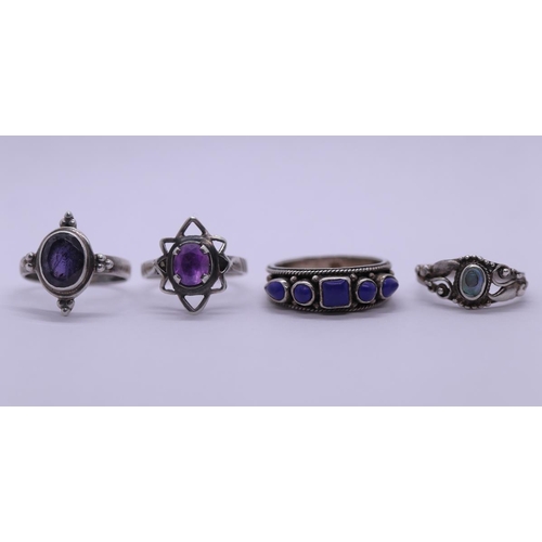 56 - 4 silver stone set rings