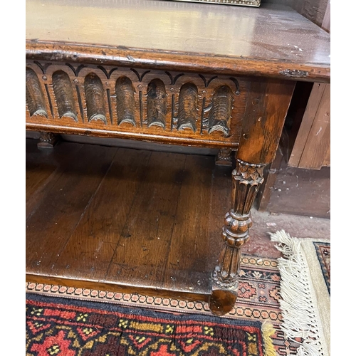 639 - Carved oak coffee table - Approx W: 122cm D: 54cm H: 45cm