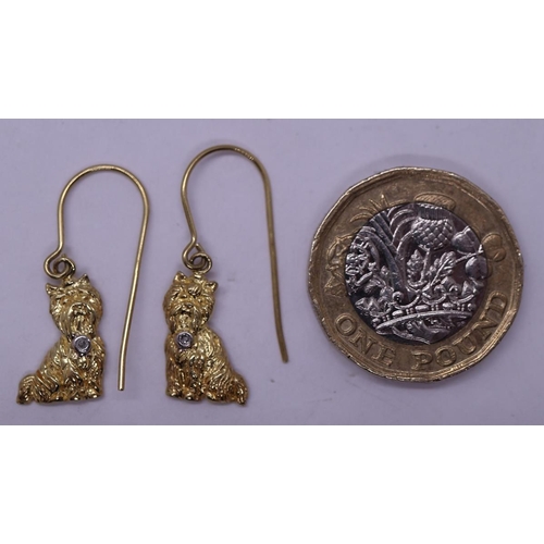 67 - Pair of silver gilt diamond set dog earrings