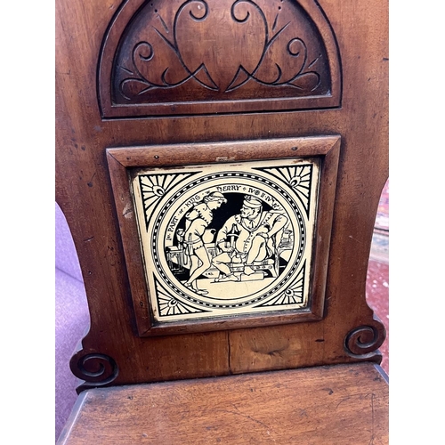 680 - Pair walnut of Moyr Smith chairs with Shakespeare tiles to backs