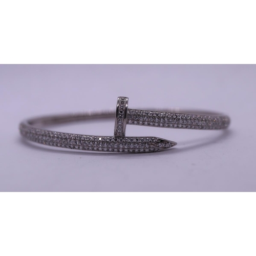 71 - Unusual silver stone set nail bangle