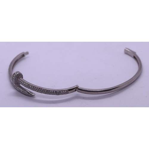 71 - Unusual silver stone set nail bangle