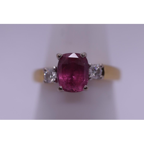 91 - 18ct gold ruby & diamond 3 stone ring - Size L