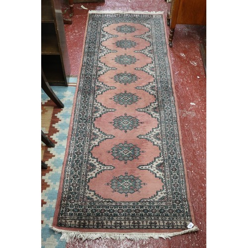 703 - Pakistan handwoven signed Bokhara pattern runner. 223cm x 80cm