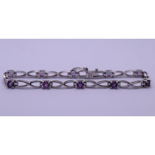 11 - Silver amethyst set bracelet