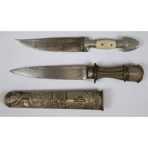 154 - Late 19thC - early 20thC Tibetan Husa Khampa knife with white metal scabbard, grip and pommel, toget... 