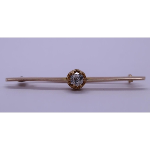 22 - Gold diamond set tie pin