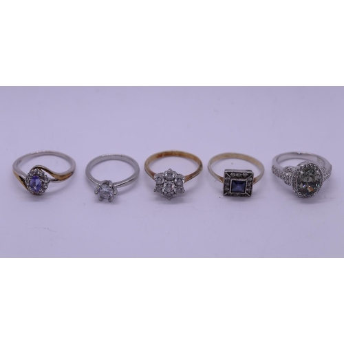 36 - 5 silver stone set rings