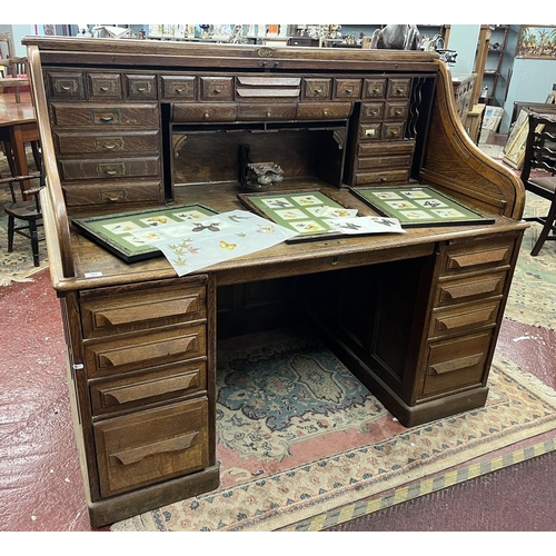 382 - Large oak roll top desk by Cutler - Approx W: 150cm D: 90cm H: 130cm