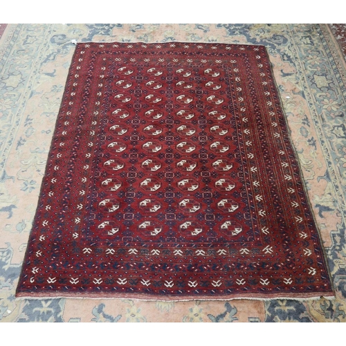 422 - Early 20thC tribal nomad, Afghan 'Bokhara' style, all wool, handwoven rug - Approx 210cm x 153cm