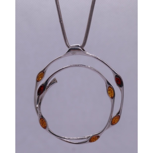 46 - Silver amber set pendent on silver chain