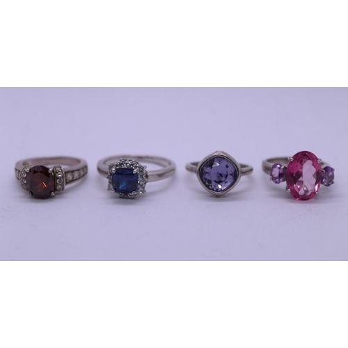 63 - 4 stone set rings