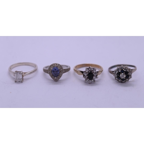 78 - 4 stone set rings