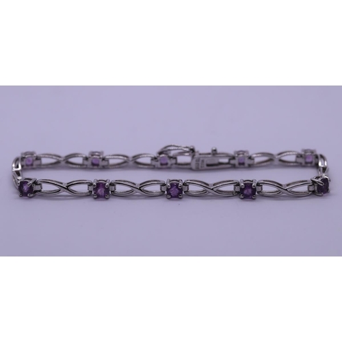 11 - Silver amethyst set bracelet