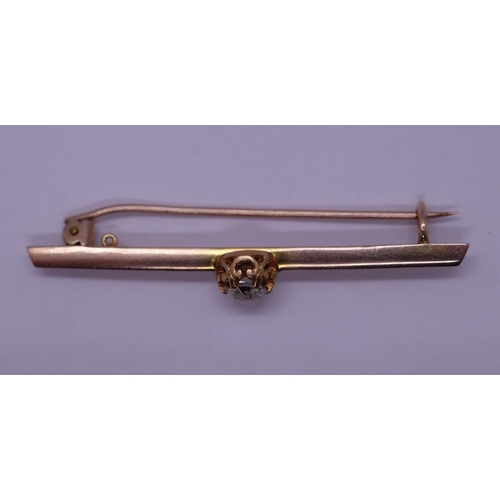 22 - Gold diamond set tie pin