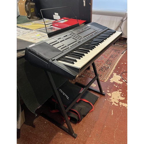 266 - Technics SX-K700 PMC electronic keyboard together with stand, foot pedal, carry case and book in goo... 