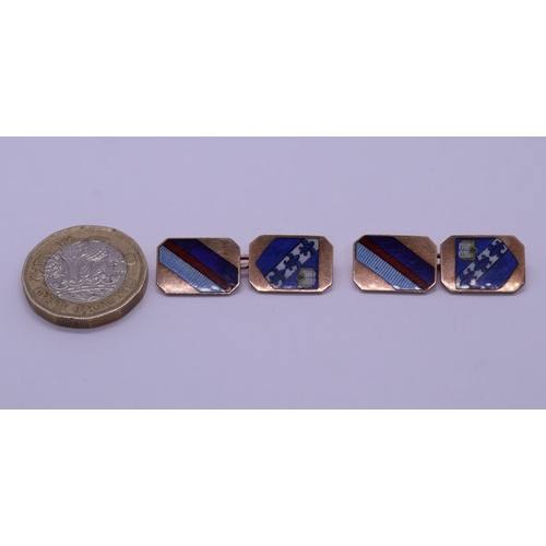 27 - Pair of gold and enamel cufflinks