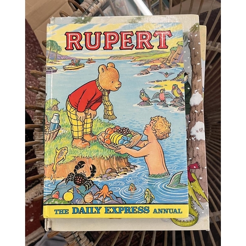 297 - Collection of Rupert the Bear annuals and books