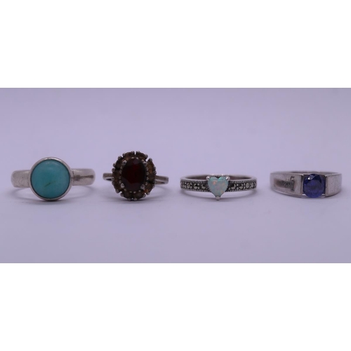 32 - 4 silver stone set rings