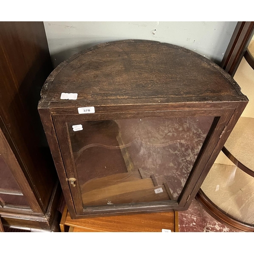 378 - Oak, barrel-backed alcove cabinet