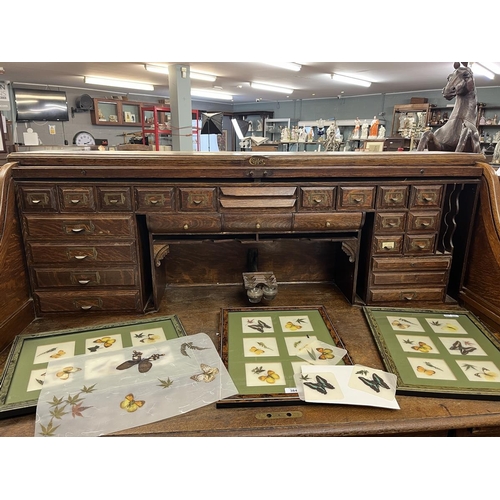 382 - Large oak roll top desk by Cutler - Approx W: 150cm D: 90cm H: 130cm