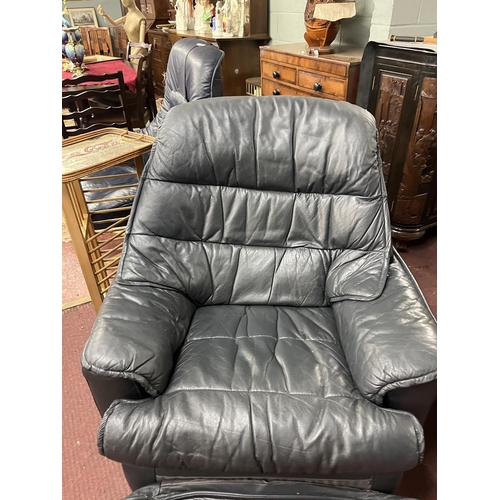 470 - Pair of leather swivel reclining armchairs