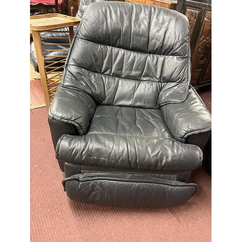 470 - Pair of leather swivel reclining armchairs