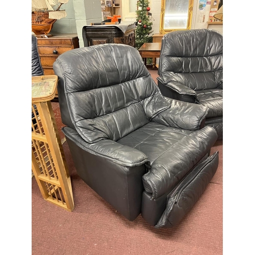 470 - Pair of leather swivel reclining armchairs