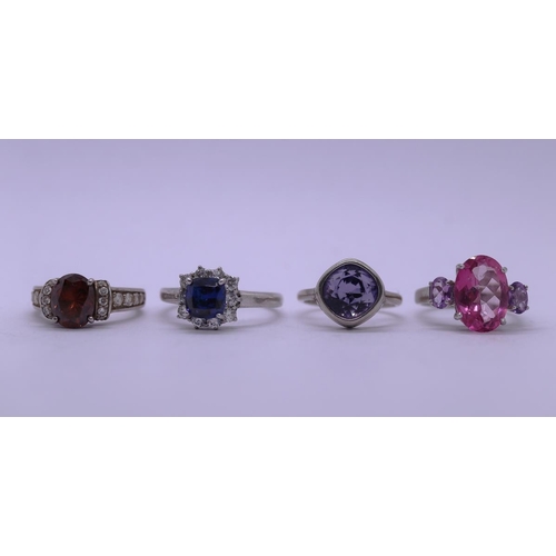 63 - 4 stone set rings