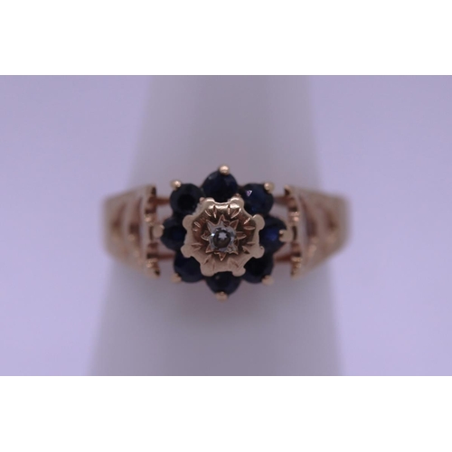 66 - 9ct gold sapphire and diamond set ring - size M - Approx weight 2.5g