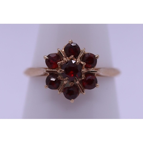 72 - 9ct gold garnet cluster ring, size N - Approx 2g